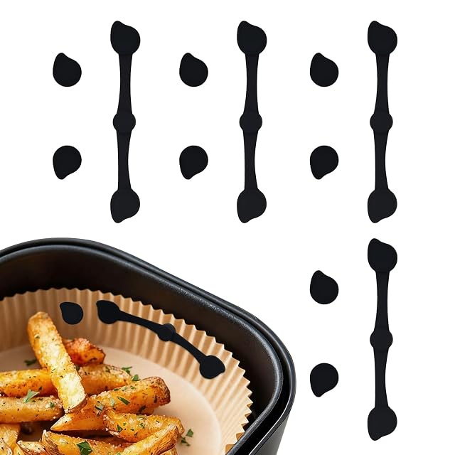 Twelve silicone-sleeved magnets for holding baking paper in an air fryer